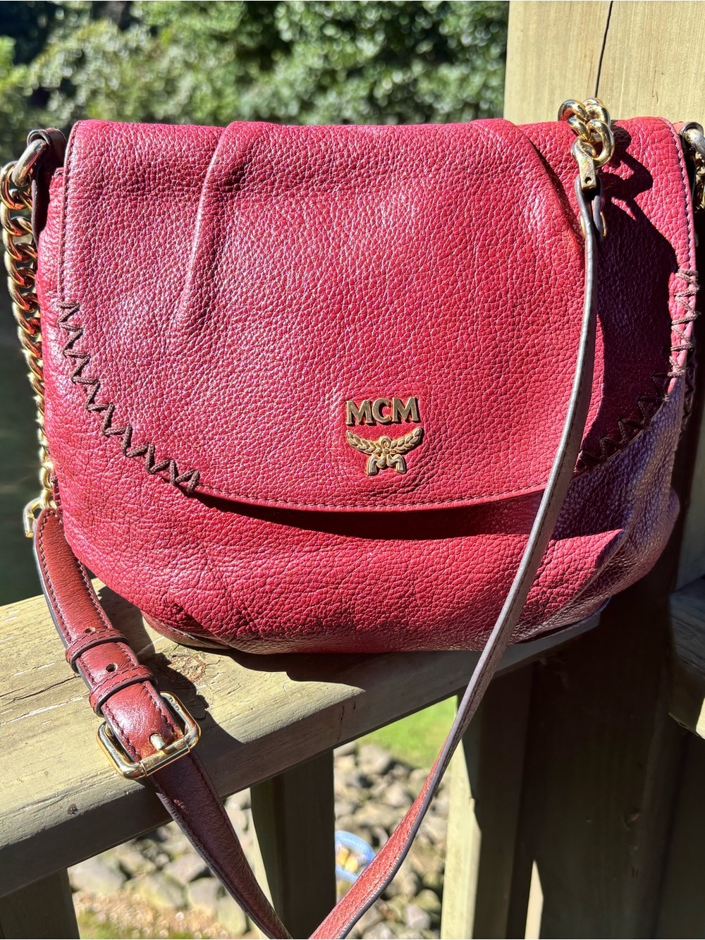 MCM Burgundy Pebbled Leather Crossbody Bag with Gold Hardware